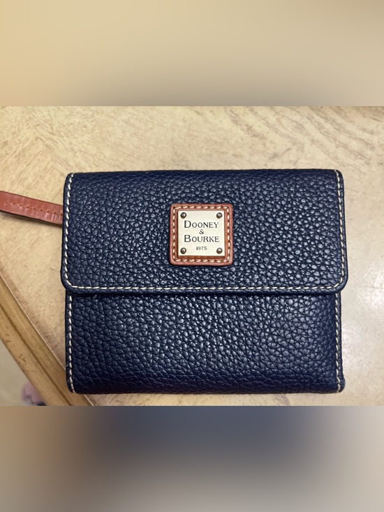 Dooney & Bourke Handbags - Dooney & Bourke Navy Pebbled Leather Wallet with Tan Trim and Red Interior.